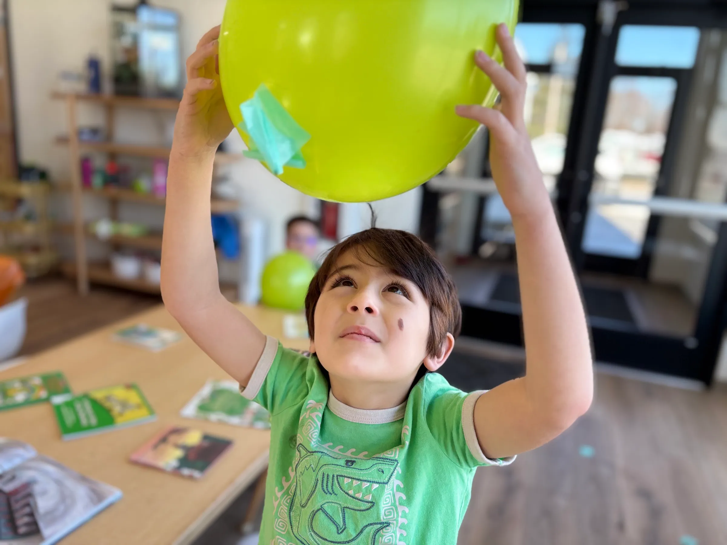 Small group of kindergarteners engaged in a hands-on learning activity at Spark Academy in Morton, Illinois