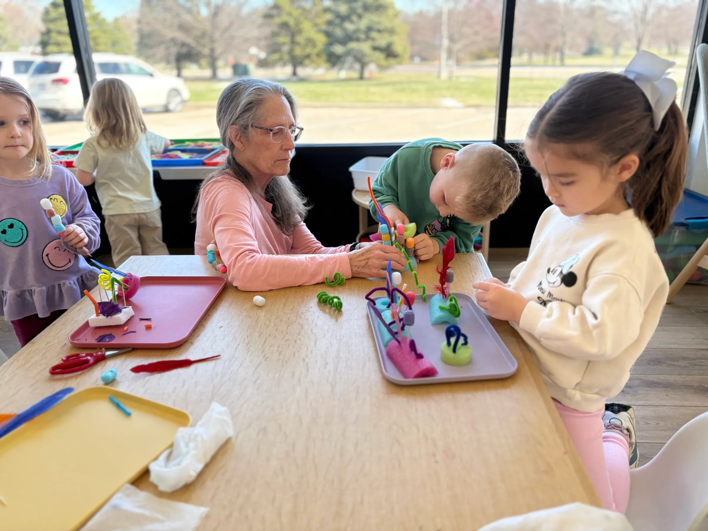 Four-year-old children collaborating on a purposeful learning project at Spark Academy preschool in Morton, Illinois