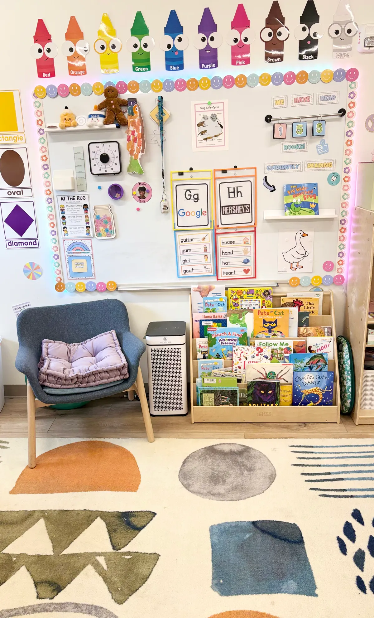 A cozy reading nook at Spark Academy with picture books, soft chair, and colorful learning displays